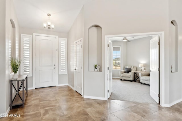 27420 N 170th St, Rio Verde, AZ 85263 - carpeted foyer featuring tile patterned flooring, a notable chandelier, and baseboards