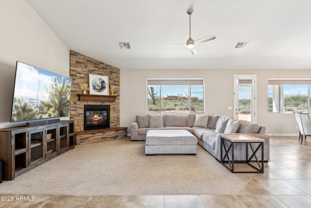 27420 N 170th St, Rio Verde, AZ 85263 - tiled living area featuring a wealth of natural light, visible vents, and a stone fireplace