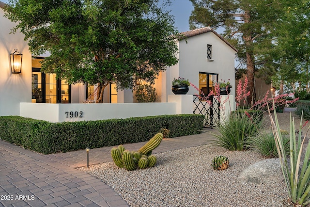view of home's exterior with stucco siding