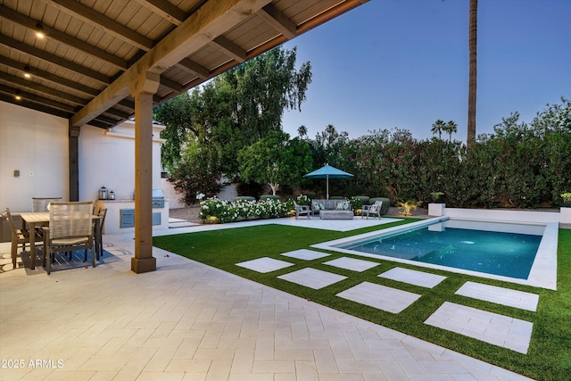 outdoor pool featuring outdoor dining area, a yard, a patio area, and outdoor lounge area