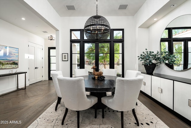 dining area featuring recessed lighting, a notable chandelier, visible vents, and french doors