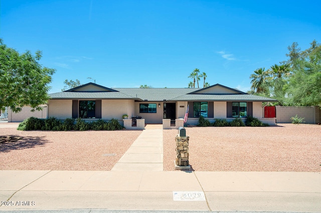 4079 E Shangri La Rd, Phoenix, AZ 85028 - single story home with covered porch and fence