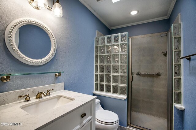 4079 E Shangri La Rd, Phoenix, AZ 85028 - bathroom featuring a stall shower, crown molding, toilet, a textured wall, and vanity
