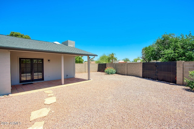 4079 E Shangri La Rd, Phoenix, AZ 85028 - view of yard featuring a gate, fence, and a patio area