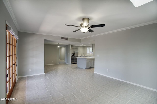 4079 E Shangri La Rd, Phoenix, AZ 85028 - unfurnished living room featuring ornamental molding, ceiling fan, and baseboards