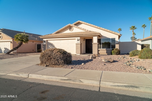 ranch-style home featuring a garage