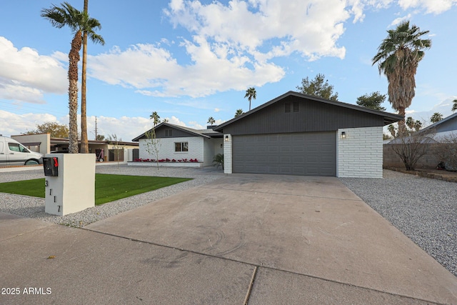 single story home with a garage and a front lawn