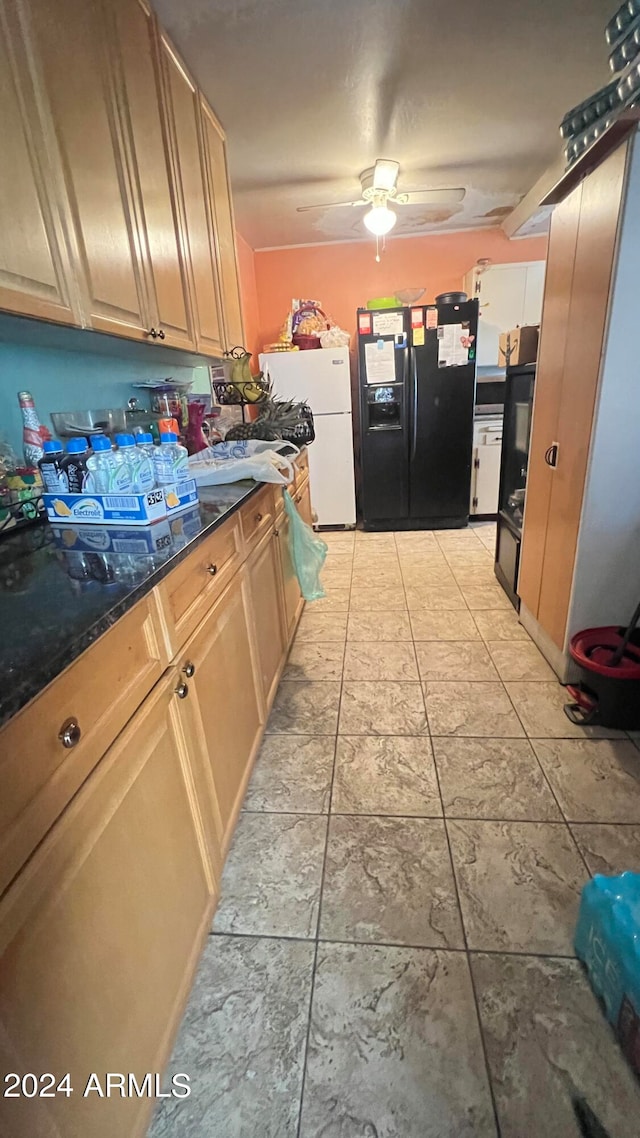 kitchen featuring ceiling fan, black refrigerator with ice dispenser, light tile floors, and white fridge