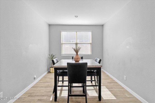 19447 W Mariposa Dr, Litchfield Park, AZ 85340 - dining room featuring light wood finished floors and baseboards