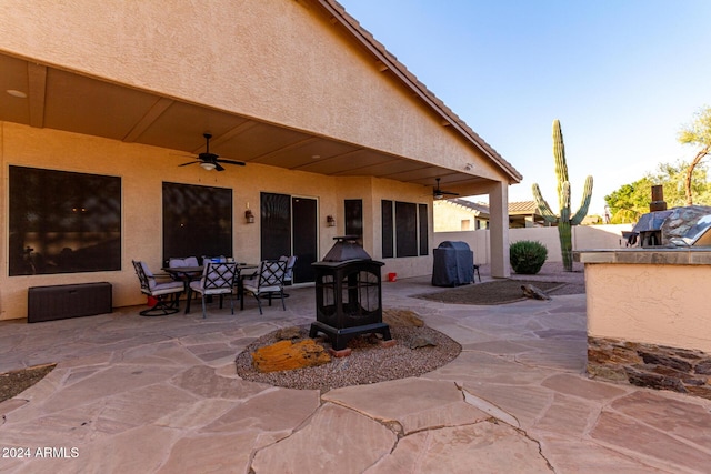 view of patio / terrace featuring ceiling fan