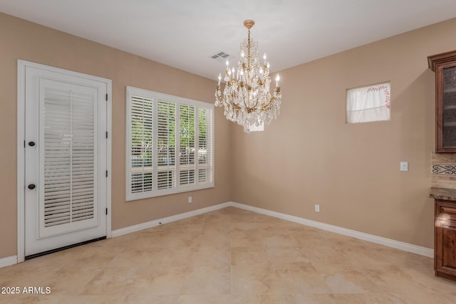 1260 E Sweet Citrus Dr, Queen Creek, AZ 85140 - unfurnished dining area with a chandelier and baseboards