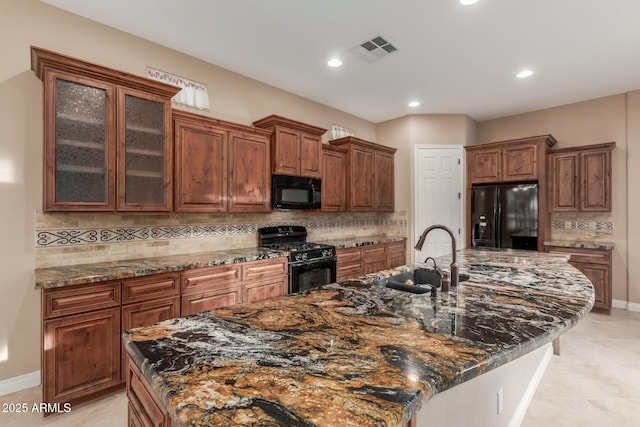 1260 E Sweet Citrus Dr, Queen Creek, AZ 85140 - kitchen with black appliances, a sink, a spacious island, decorative backsplash, and recessed lighting