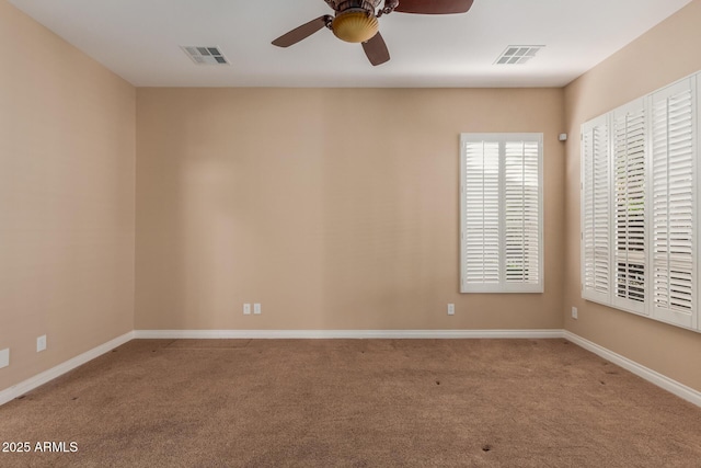 1260 E Sweet Citrus Dr, Queen Creek, AZ 85140 - spare room with carpet floors, a ceiling fan, and baseboards