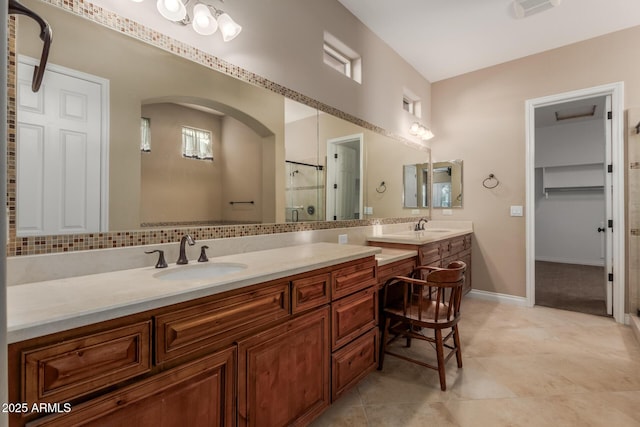 1260 E Sweet Citrus Dr, Queen Creek, AZ 85140 - bathroom featuring a shower stall, vanity, and baseboards
