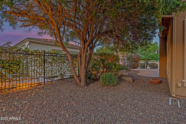 1260 E Sweet Citrus Dr, Queen Creek, AZ 85140 - yard at dusk with fence