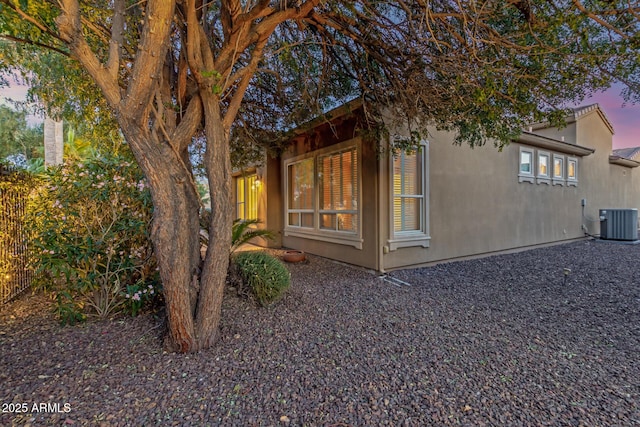 1260 E Sweet Citrus Dr, Queen Creek, AZ 85140 - property exterior at dusk with central AC unit