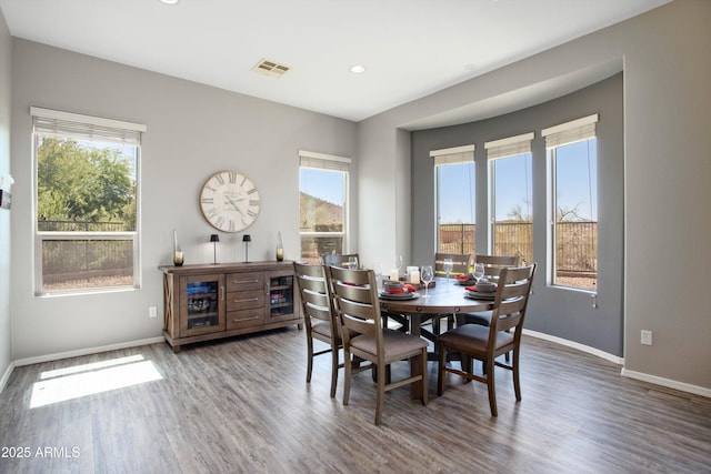 13072 W Alyssa Ln, Peoria, AZ 85383 - dining room featuring baseboards, plenty of natural light, wood finished floors, and recessed lighting