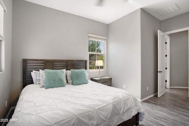 13072 W Alyssa Ln, Peoria, AZ 85383 - bedroom featuring wood finished floors, baseboards, and a ceiling fan