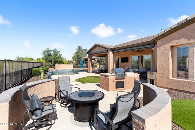 13072 W Alyssa Ln, Peoria, AZ 85383 - fenced backyard with an outdoor fire pit, a patio, and ceiling fan
