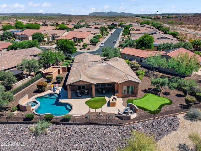 13072 W Alyssa Ln, Peoria, AZ 85383 - aerial view of residential area with a pool and mountains