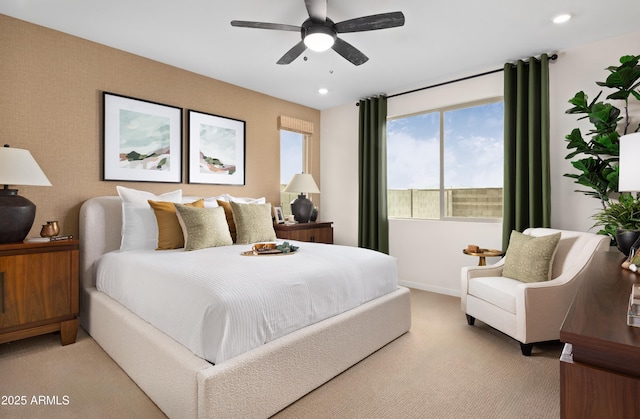 bedroom with light carpet and ceiling fan