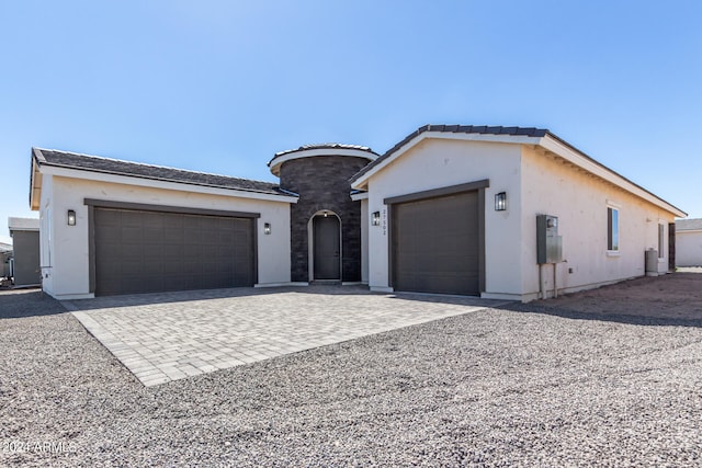 view of front of property featuring a garage