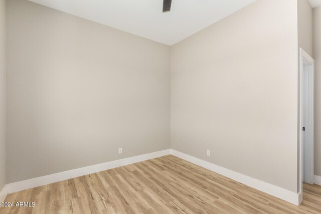 unfurnished room featuring light hardwood / wood-style floors