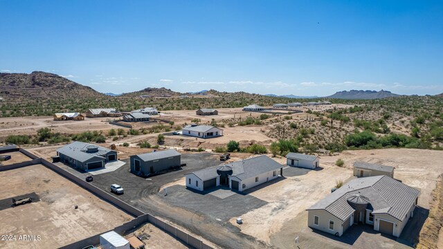 drone / aerial view featuring a mountain view