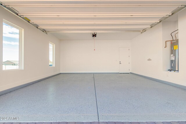 garage featuring electric water heater