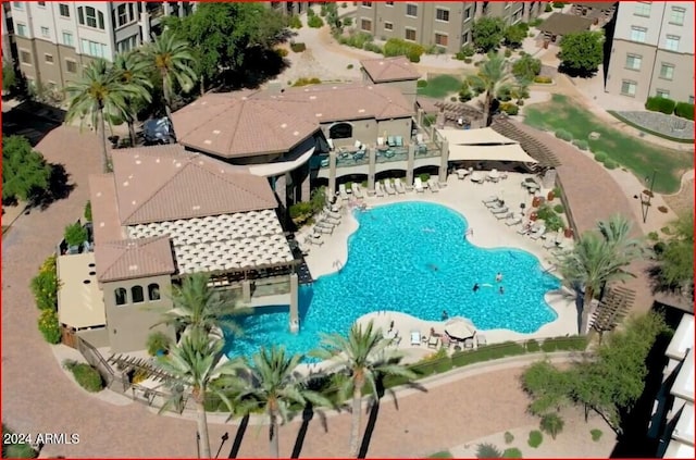 view of swimming pool with a patio area