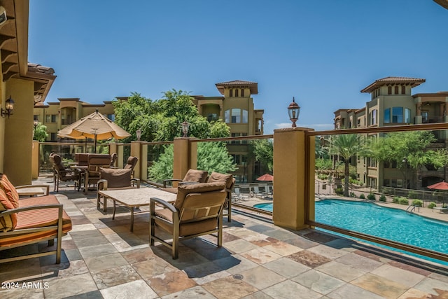 view of patio with a community pool