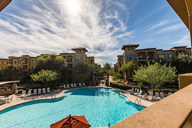 view of swimming pool with a patio area