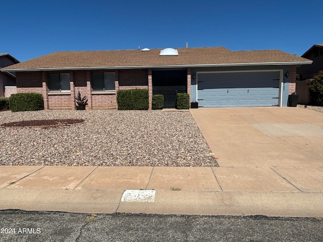 ranch-style home with a garage