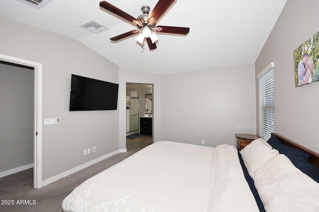 2005 E Anderson Dr E, Phoenix, AZ 85022 - bedroom with vaulted ceiling, baseboards, ensuite bath, and ceiling fan
