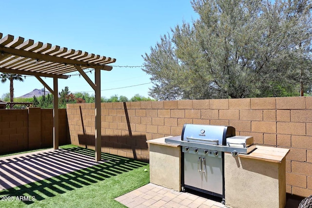 2005 E Anderson Dr E, Phoenix, AZ 85022 - view of patio / terrace featuring area for grilling, fence, a pergola, and a grill