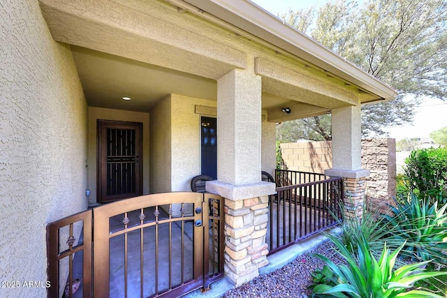 2005 E Anderson Dr E, Phoenix, AZ 85022 - doorway to property with stucco siding and a porch