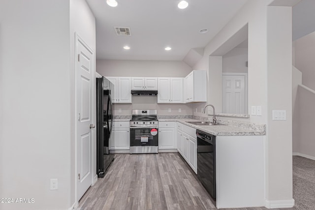 kitchen with stainless steel range, refrigerator, sink, dishwasher, and white cabinetry