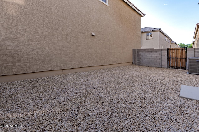 view of yard featuring central AC unit