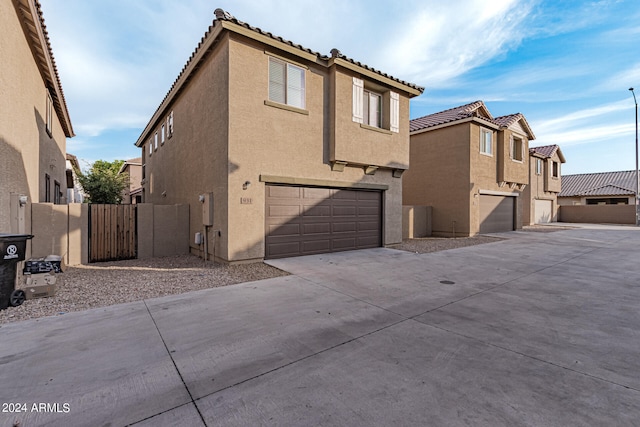 exterior space with a garage