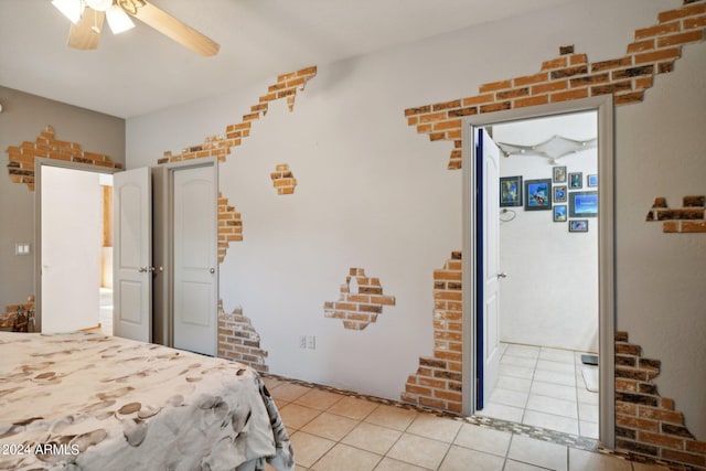 bedroom with light tile patterned flooring and ceiling fan