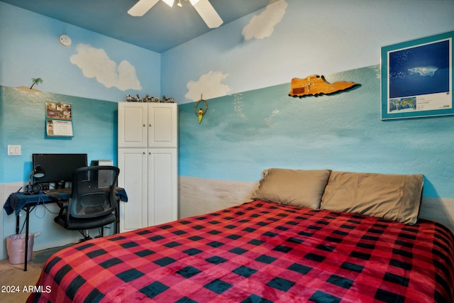 bedroom featuring light colored carpet and ceiling fan