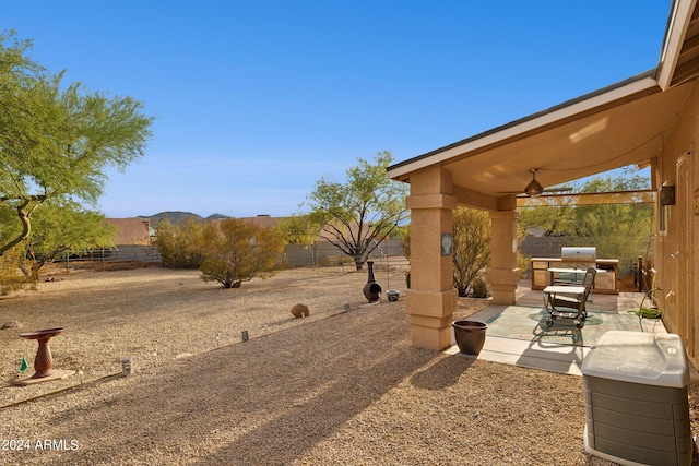 view of yard featuring a patio area and a fenced backyard