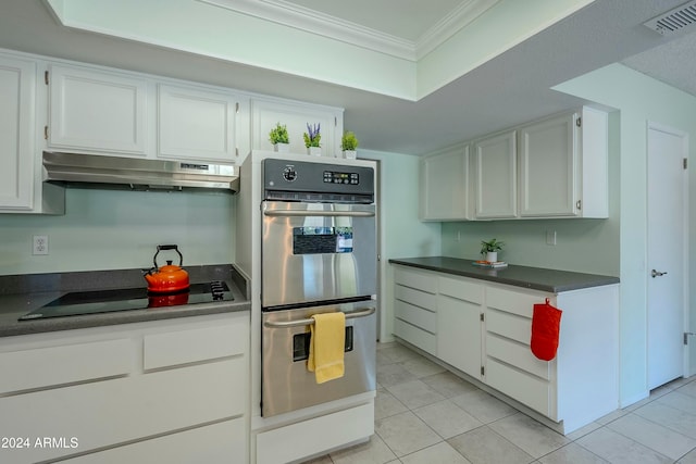 kitchen with white cabinets, stainless steel double oven, black electric cooktop, and ornamental molding