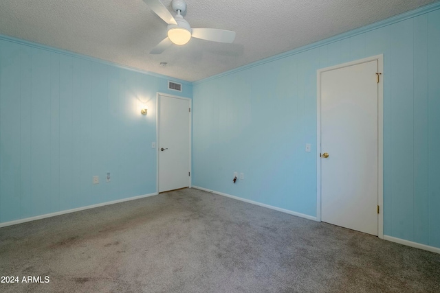 unfurnished room with light carpet, a textured ceiling, and ceiling fan