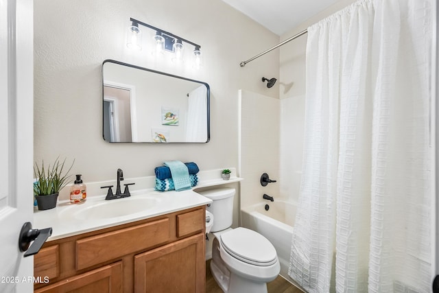 full bathroom with toilet, shower / bathtub combination with curtain, and vanity