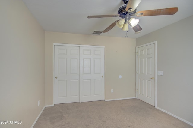 274 S 18th St, Coolidge, AZ 85128 - unfurnished bedroom featuring a closet, light colored carpet, and ceiling fan