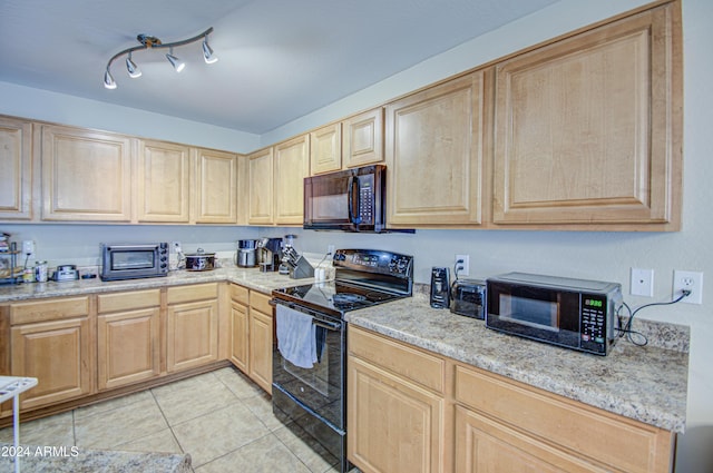 274 S 18th St, Coolidge, AZ 85128 - kitchen with light tile patterned floors, light brown cabinets, light stone counters, and black appliances