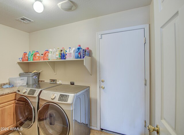 274 S 18th St, Coolidge, AZ 85128 - washroom featuring washing machine and clothes dryer, cabinets, and a textured ceiling