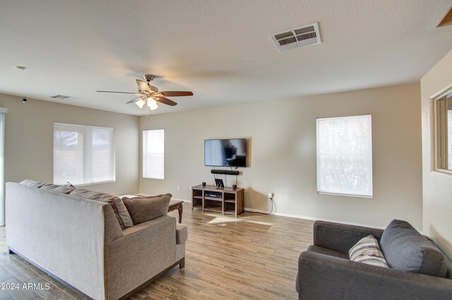 274 S 18th St, Coolidge, AZ 85128 - living room featuring ceiling fan and hardwood / wood-style floors