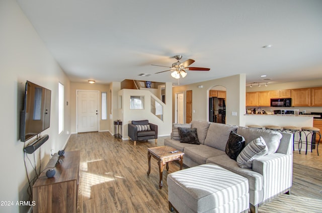 274 S 18th St, Coolidge, AZ 85128 - living room featuring ceiling fan and light hardwood / wood-style flooring